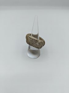 A finger ring made from animal bone, with rectangular bezel