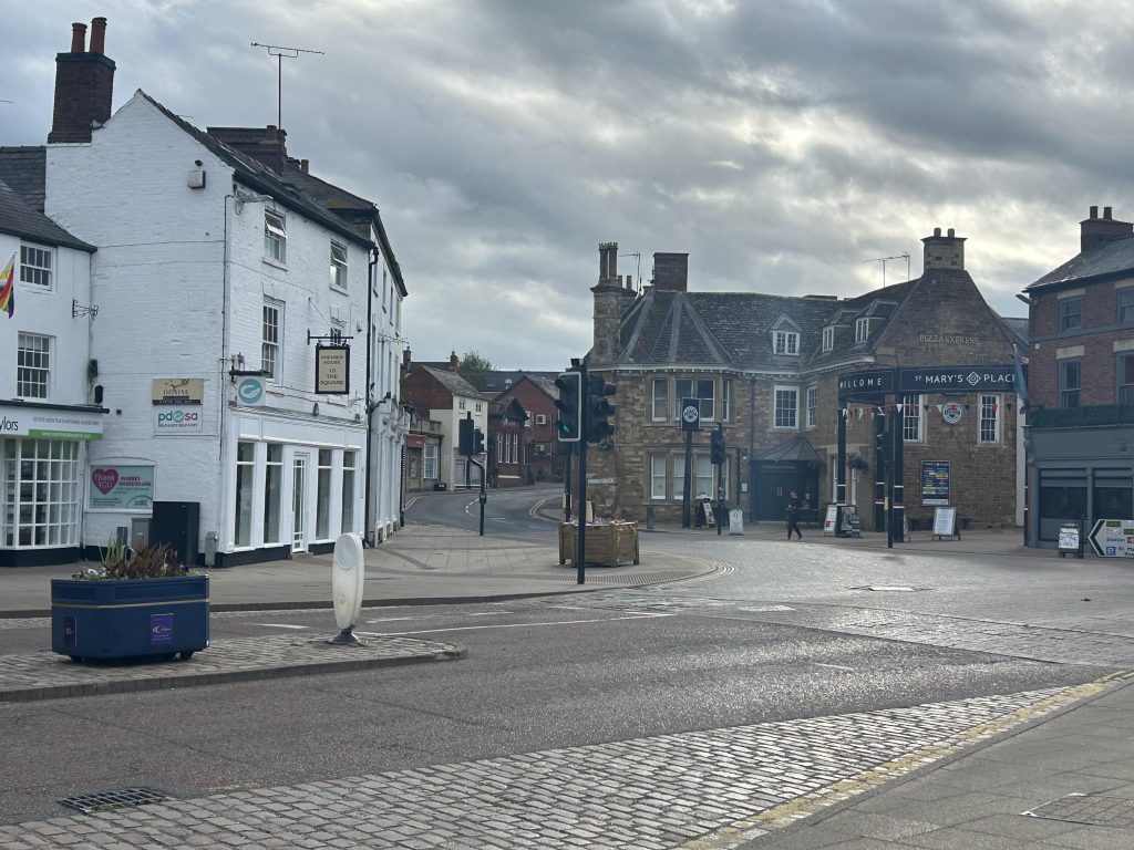 A road junction with shops and restaurants